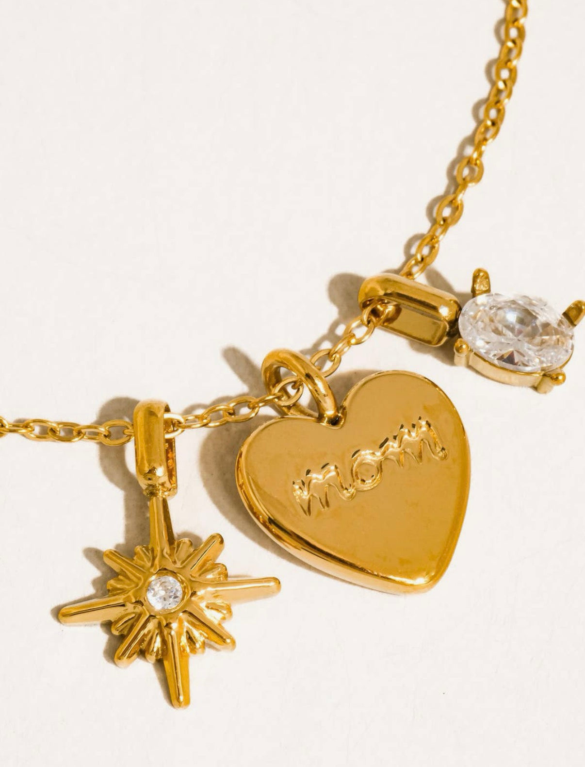 “Mom” charm necklace